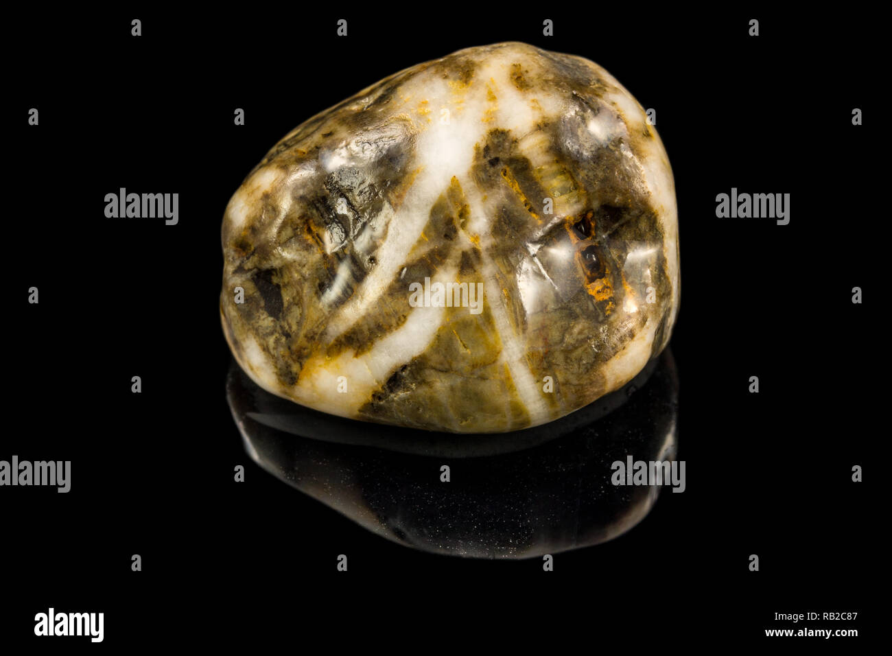 Colorful stone with different designs and colors and black background Stock Photo