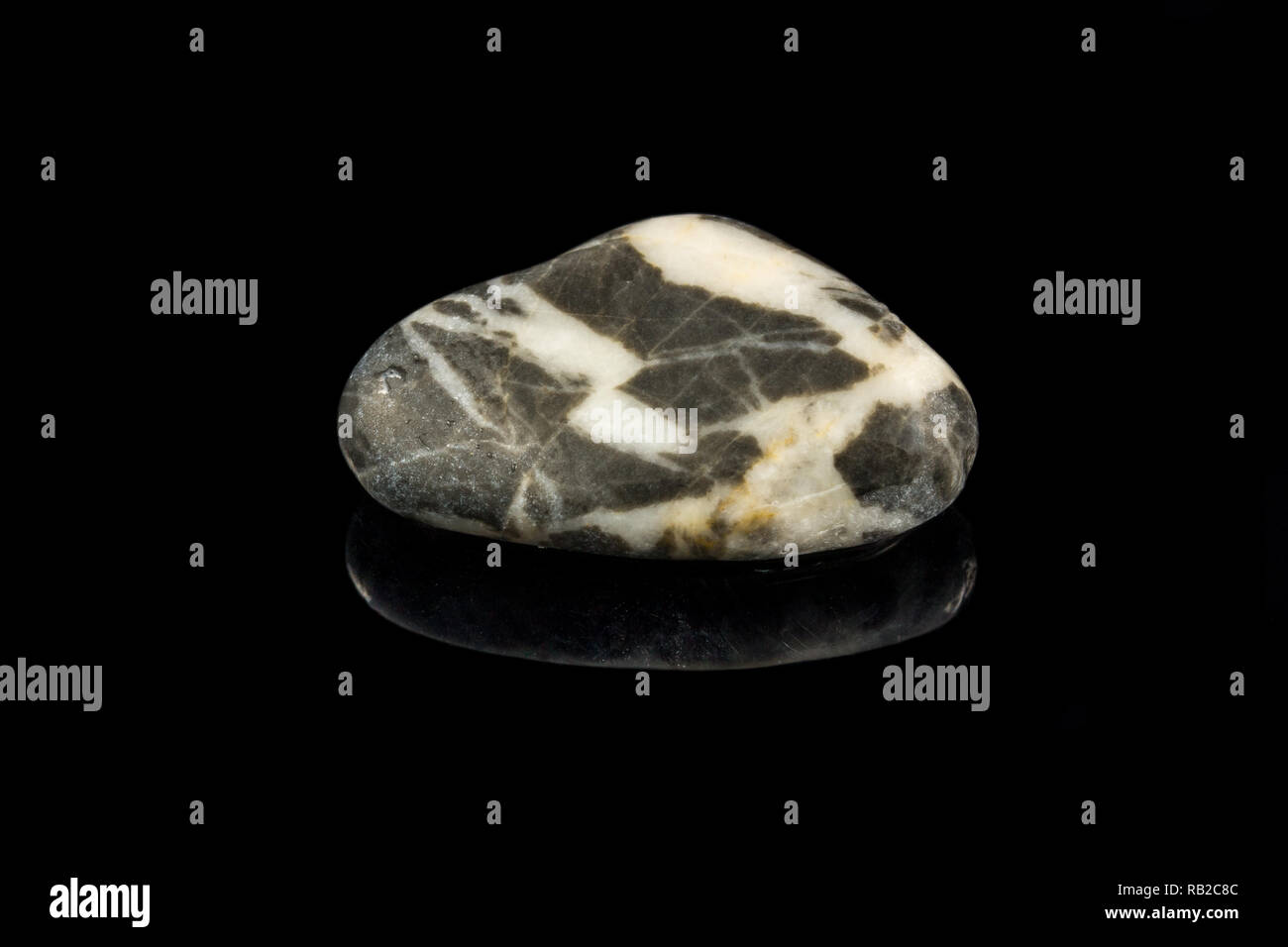 Colorful stone with different designs and colors and black background Stock Photo