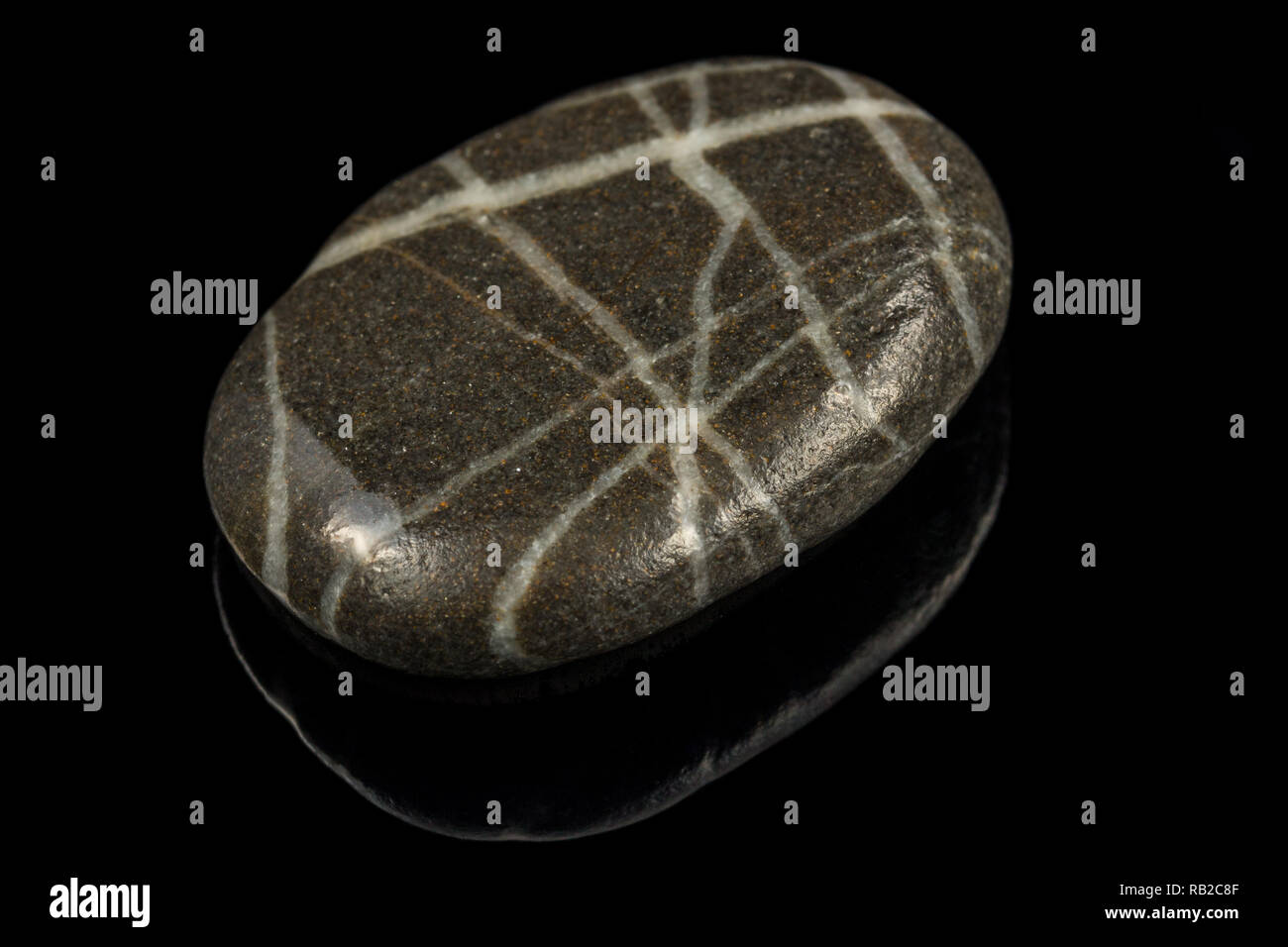 Colorful stone with different designs and colors and black background Stock Photo