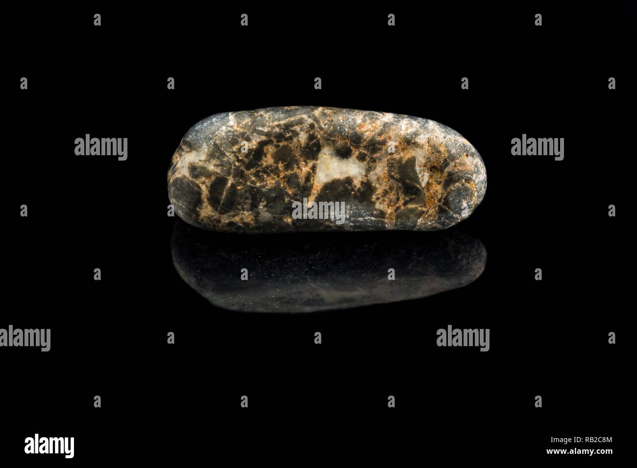 Colorful stone with different designs and colors and black background Stock Photo