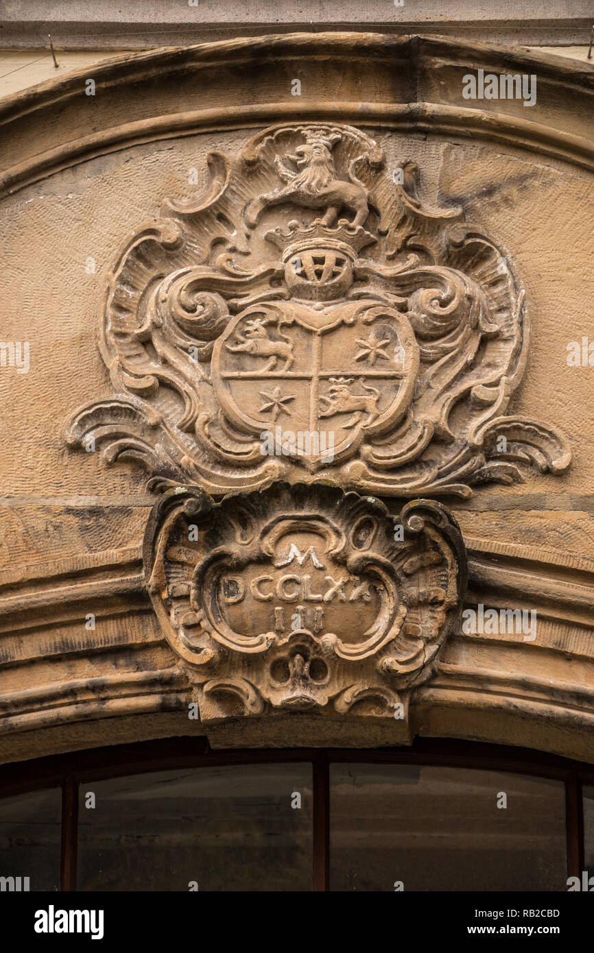 Old historical building with coats of arms made of stone Stock Photo