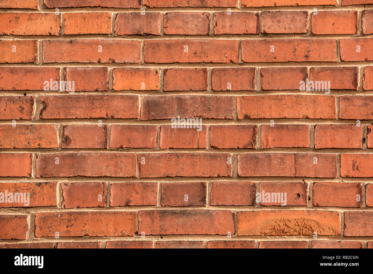 Old empty brick house factory wall with red bricks Stock Photo