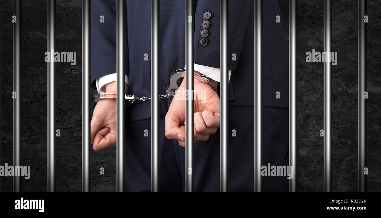 Close convicted man handcuffs hi-res stock photography and images - Alamy