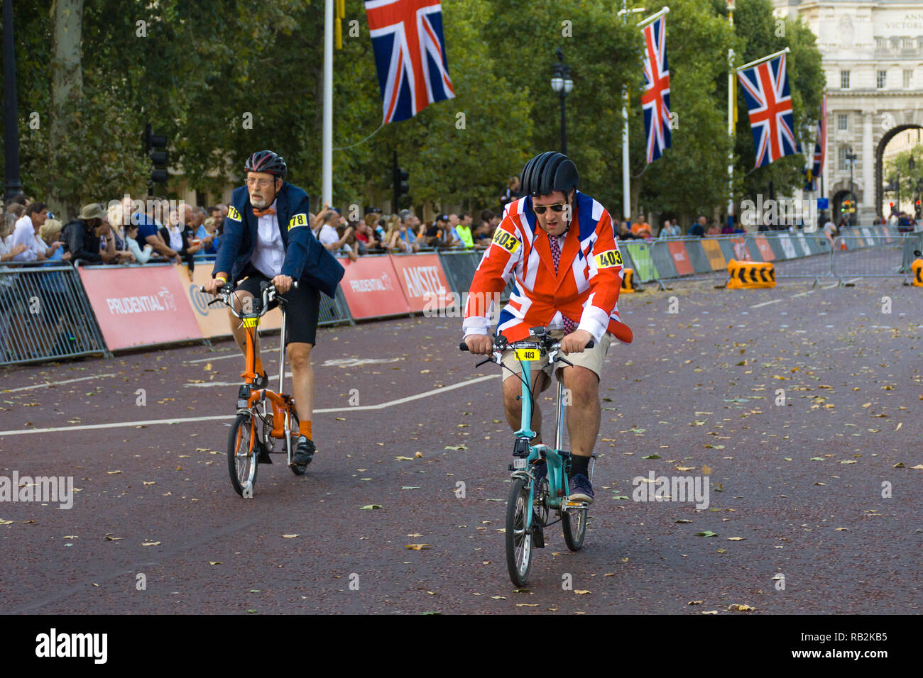 Cyclists racing along The Mall with onlooking crowd, Brompton World Championships 2018, London, UK Stock Photo