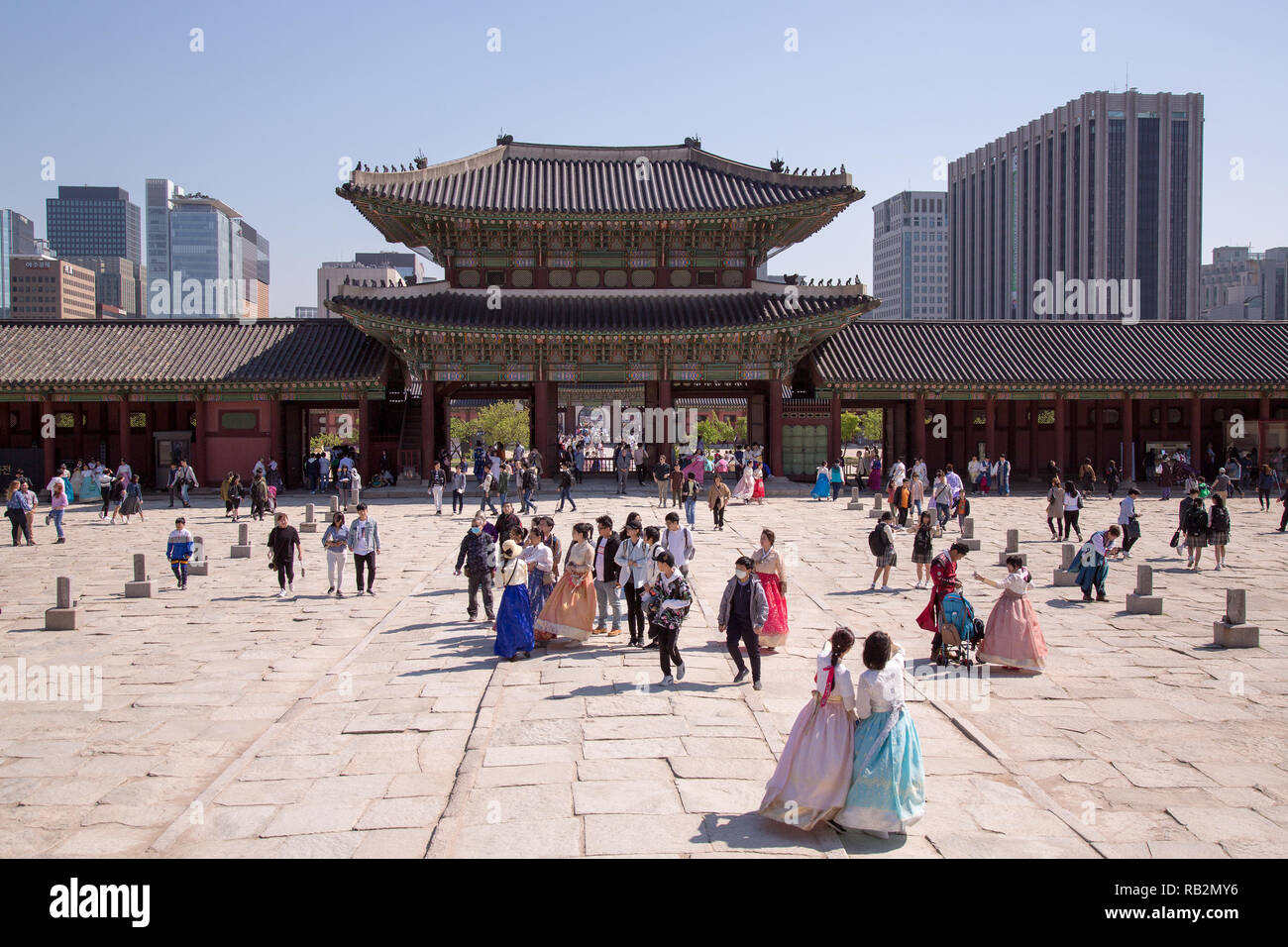 Visitors at the Gyeongbokgung Palace in Seoul, South Korea. Stock Photo