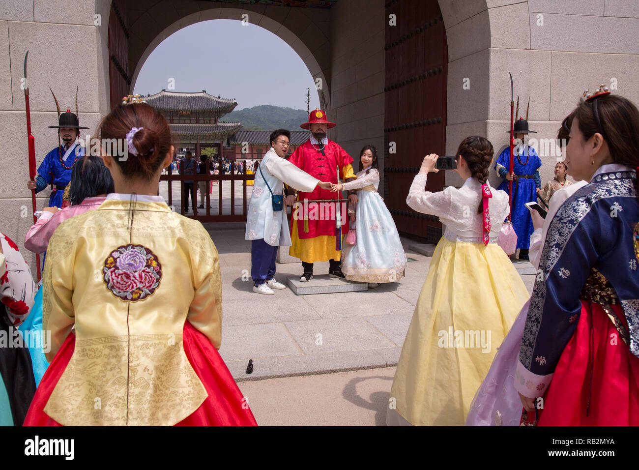 Visitors at the Gyeongbokgung Palace in Seoul, South Korea. Stock Photo