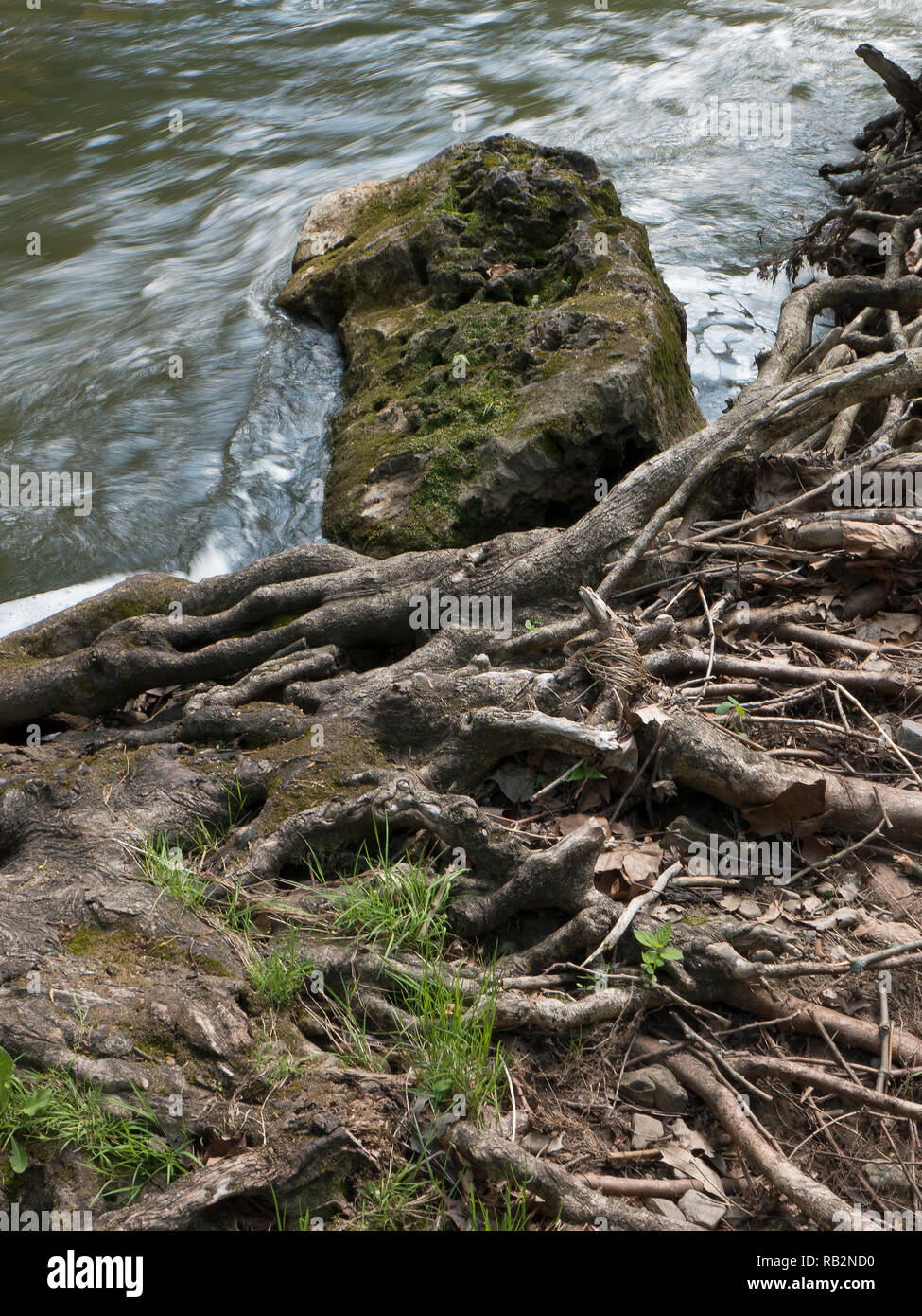 Water rushing pest boulders in Channing H. Philbrick Park, Penfield NY. Stock Photo
