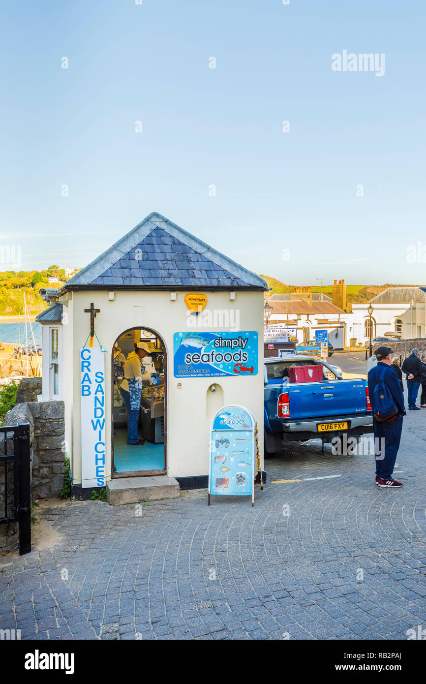 Simply Seafoods, a harbourside seafood fishmongers and sandwich bar on the seafront in Tenby, a seaside town in Pembrokeshire on the south Wales coast Stock Photo