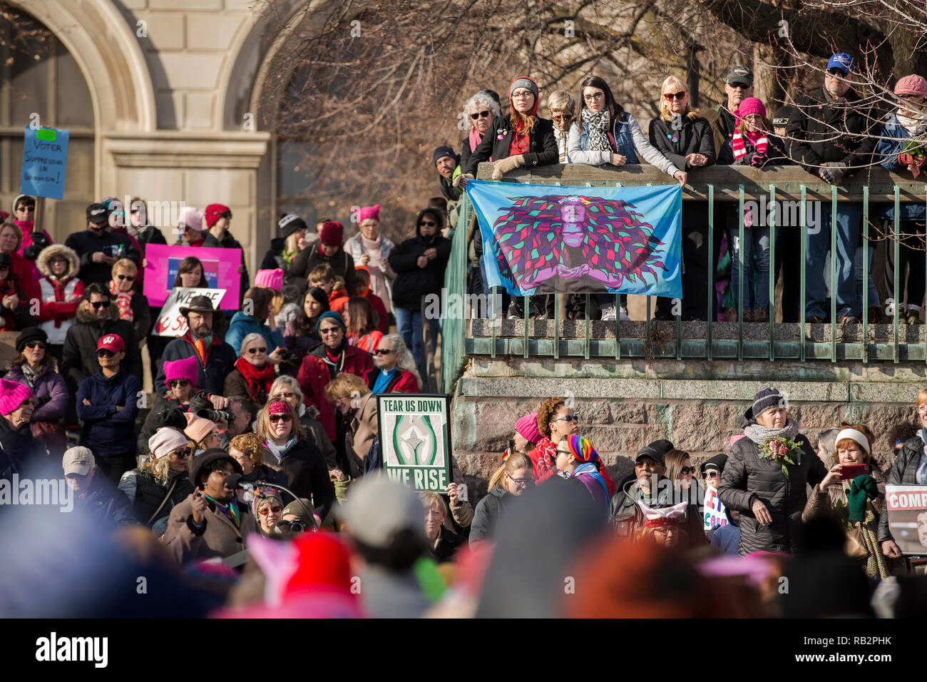 A large crowd participates in the 2018 Women's March Rally outside of the Milwaukee County Court House on Saturday January 20th. Stock Photo