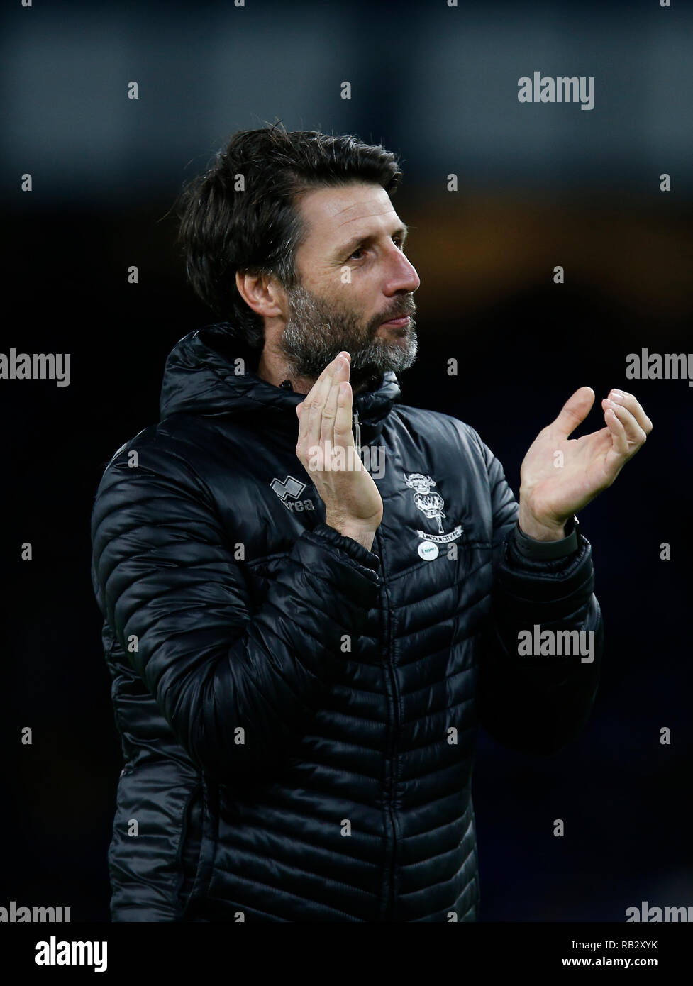Liverpool, UK. 5th Jan, 2019.  Editorial use only, license required for commercial use. No use in betting, games or a single club/league/player publications. Emirates FA Cup third round football, Everton versus Lincoln City; Lincoln City manager Danny Cowley applauds the 5,000 plus travelling supporters after his team went down 2-1 Credit: Action Plus Sports/Alamy Live News Stock Photo