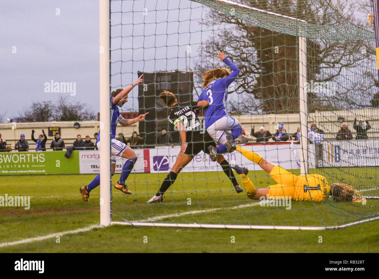 Solihull, UK. 6th January, 2019. Birmingham City's Meaghan Sargeant scores past Reading goalkeeper Grace Maloney in the 88th minute putting the Blues 2-1 ahead against Reading women. BCFC Women won 2-1. Peter Lopeman/Alamy Live News Stock Photo