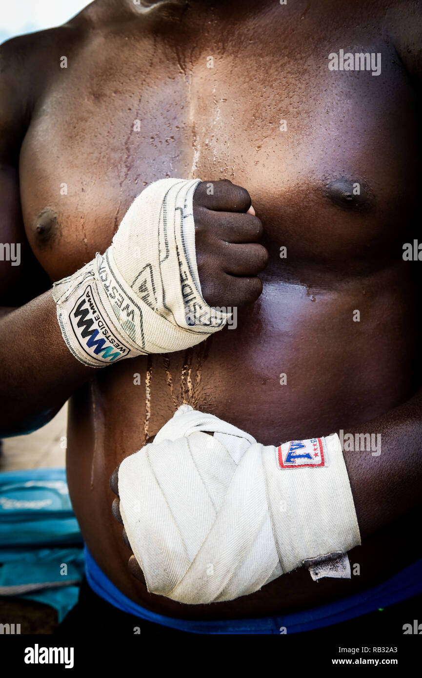 Havana, Havana, Cuba. 9th Oct, 2018. Boxer's hands with bandages at the Rafael Trejo training camp in Havana, Cuba.Cuban boxers are the most successful in the history of amateur boxing, Cuba has won 32 Olympic boxing gold medals since 1972, .In 1962, professional boxing in Cuba was banned by Fidel Castro. As a consequence of Castro's ban, if fighters want to pursue their dream of becoming world champions they have to make the heartbreaking decision to defect from the country and It can be very tough for them because they are excommunicated and separated from their families. The two main Stock Photo