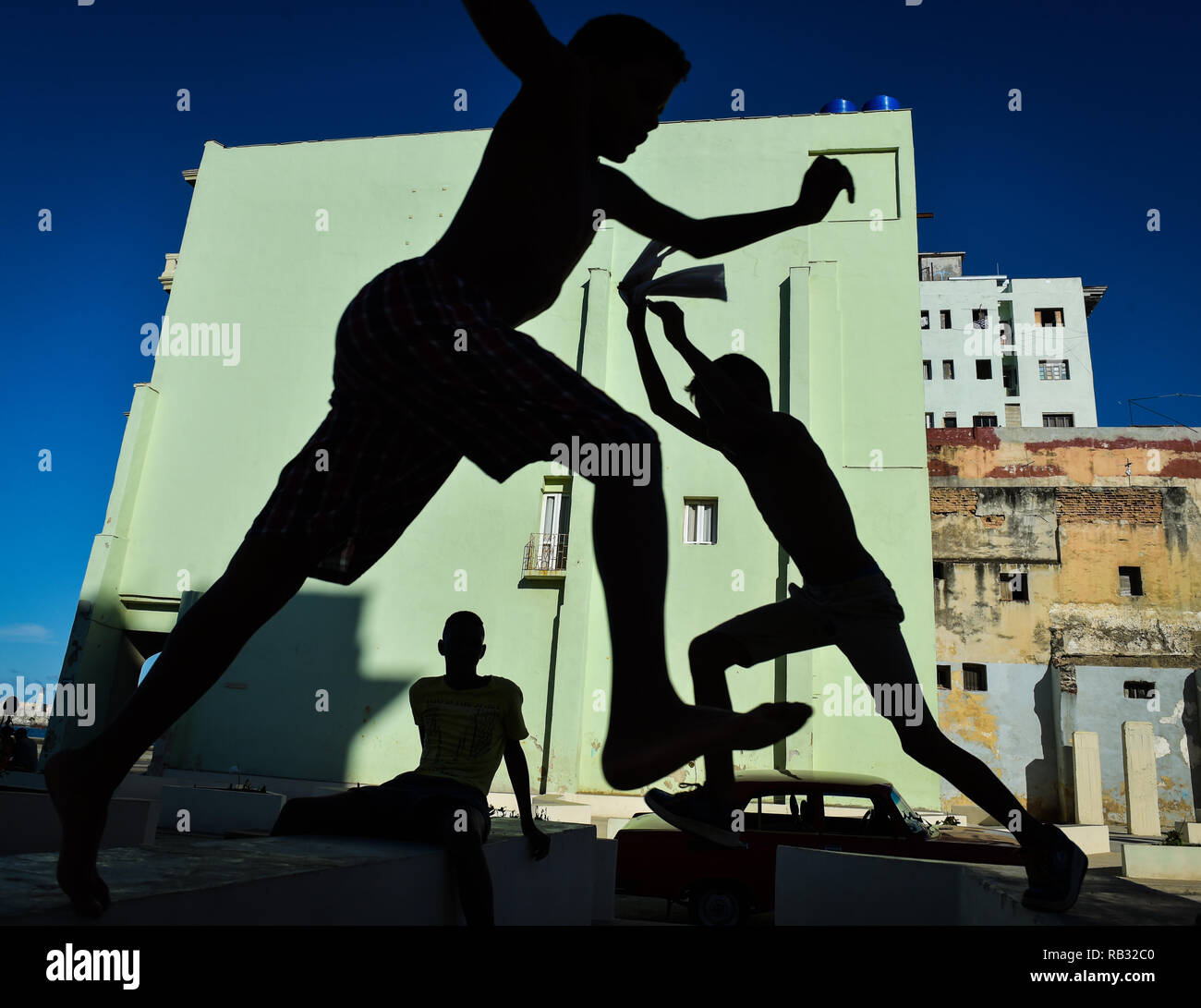 Havana, Havana, Cuba. 11th Oct, 2018. Silhouettes of young boxers seen training at the Rafael Trejo training camp in Havana, Cuba.Cuban boxers are the most successful in the history of amateur boxing, Cuba has won 32 Olympic boxing gold medals since 1972, .In 1962, professional boxing in Cuba was banned by Fidel Castro. As a consequence of Castro's ban, if fighters want to pursue their dream of becoming world champions they have to make the heartbreaking decision to defect from the country and It can be very tough for them because they are excommunicated and separated from their families. Stock Photo