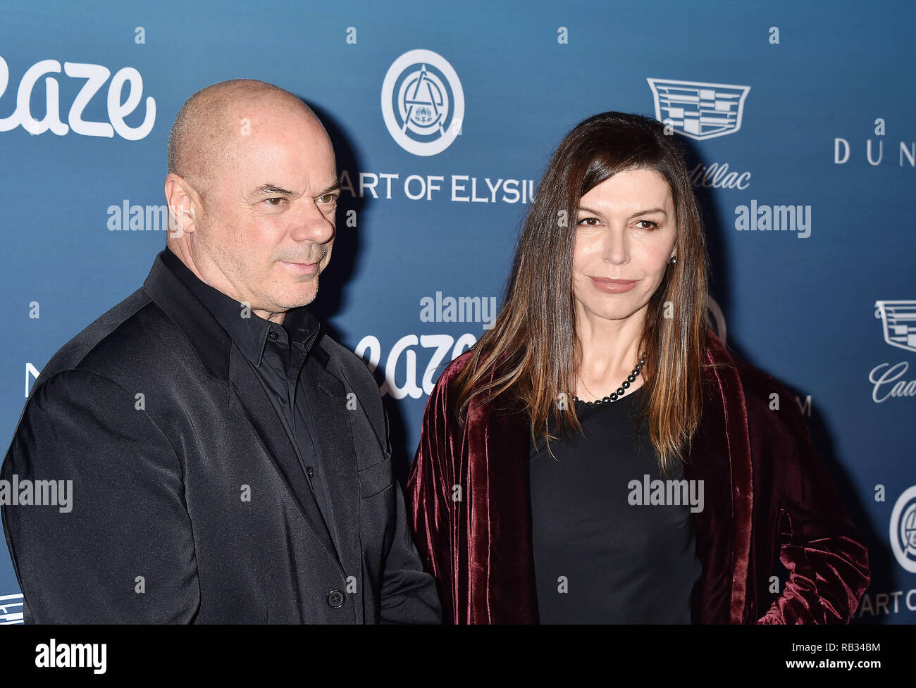 Los Angeles, USA. 5 January 2019. Russell Young (L) and Finola Hughes attend Michael Muller's HEAVEN, presented by The Art of Elysium at a private venue on January 5, 2019 in Los Angeles, California. Credit: Jeffrey Mayer/Alamy Live News Stock Photo