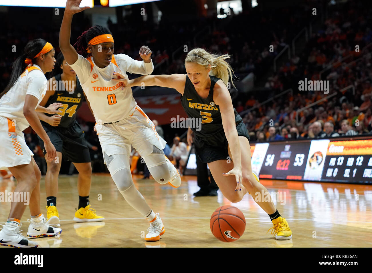 Knoxville, Tennessee, USA. 06th Jan, 2019. January 6, 2019: Sophie Cunningham #3 of the Missouri Tigers drives to the basket against Rennia Davis #0 of the Tennessee Lady Volunteers during the NCAA basketball game between the University of Tennessee Lady Volunteers and the University of Missouri Tigers at Thompson Boling Arena in Knoxville TN Tim Gangloff/CSM Credit: Cal Sport Media/Alamy Live News Stock Photo