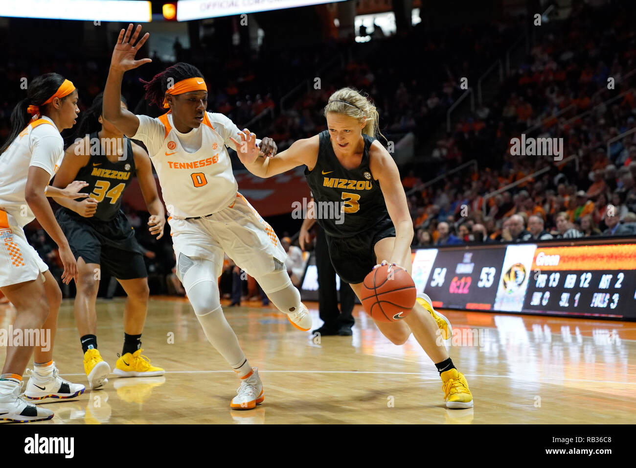 Knoxville, Tennessee, USA. 06th Jan, 2019. January 6, 2019: Sophie Cunningham #3 of the Missouri Tigers drives to the basket against Rennia Davis #0 of the Tennessee Lady Volunteers during the NCAA basketball game between the University of Tennessee Lady Volunteers and the University of Missouri Tigers at Thompson Boling Arena in Knoxville TN Tim Gangloff/CSM Credit: Cal Sport Media/Alamy Live News Stock Photo