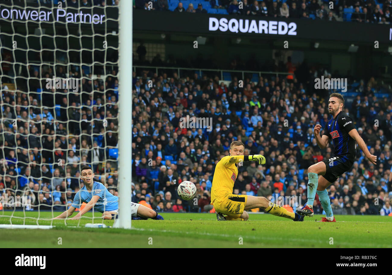 Etihad Stadium, Manchester, UK. 6th Jan, 2019. Emirates FA Cup third round football, Manchester City versus Rotherham United; Phil Foden of Manchester City beats Rotherham United goalkeeper Marek Rodak to score his team's second goal Credit: Action Plus Sports/Alamy Live News Stock Photo