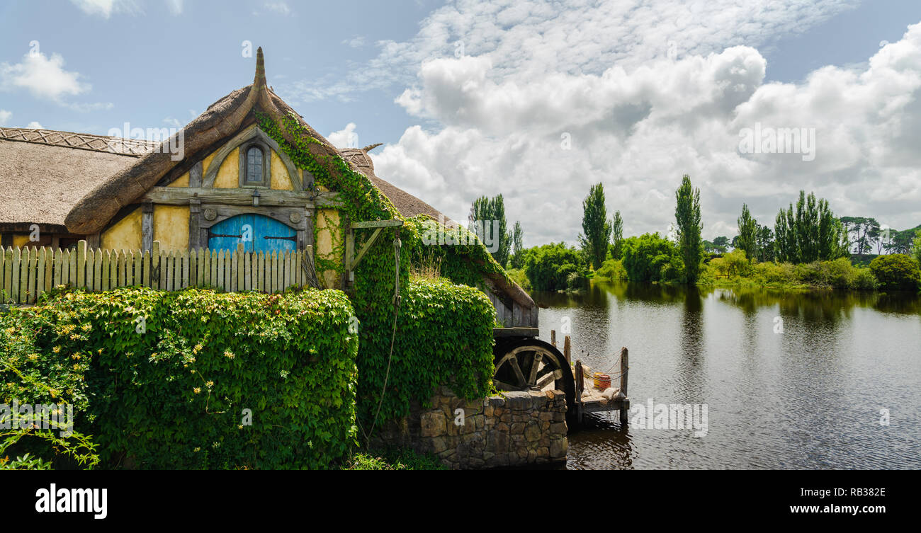 Scenery View of Hobbiton Village, Watermill in Hobbiton Movie Set in Matamata, New Zealand, January 21, 2018 Stock Photo