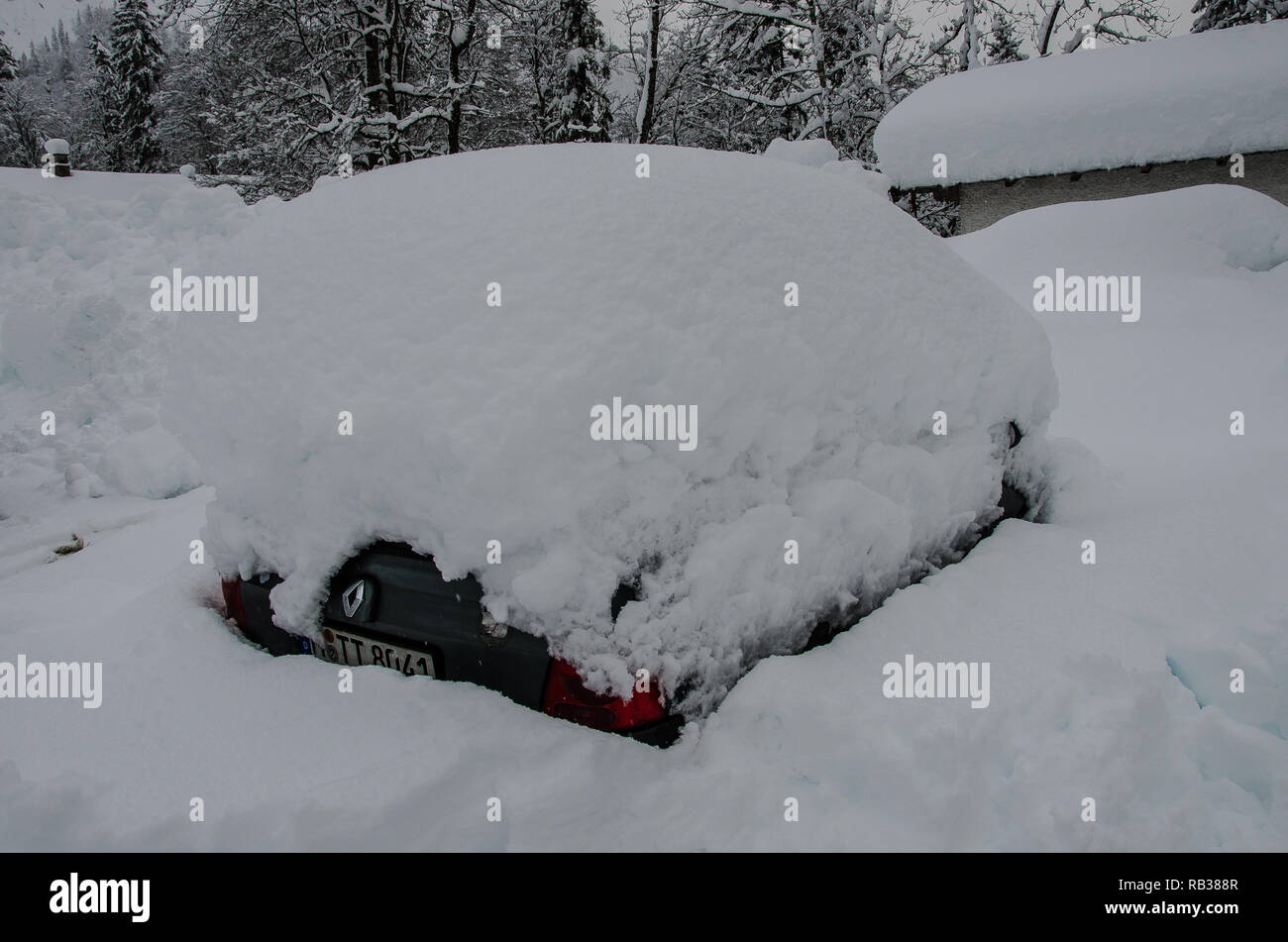 a car completely covered with snow Stock Photo