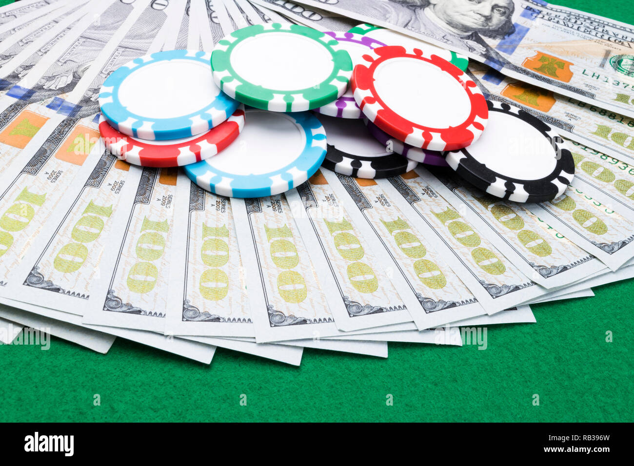 Stack of Poker chips on a dollar bills, Money. Poker table at the casino. Poker game concept