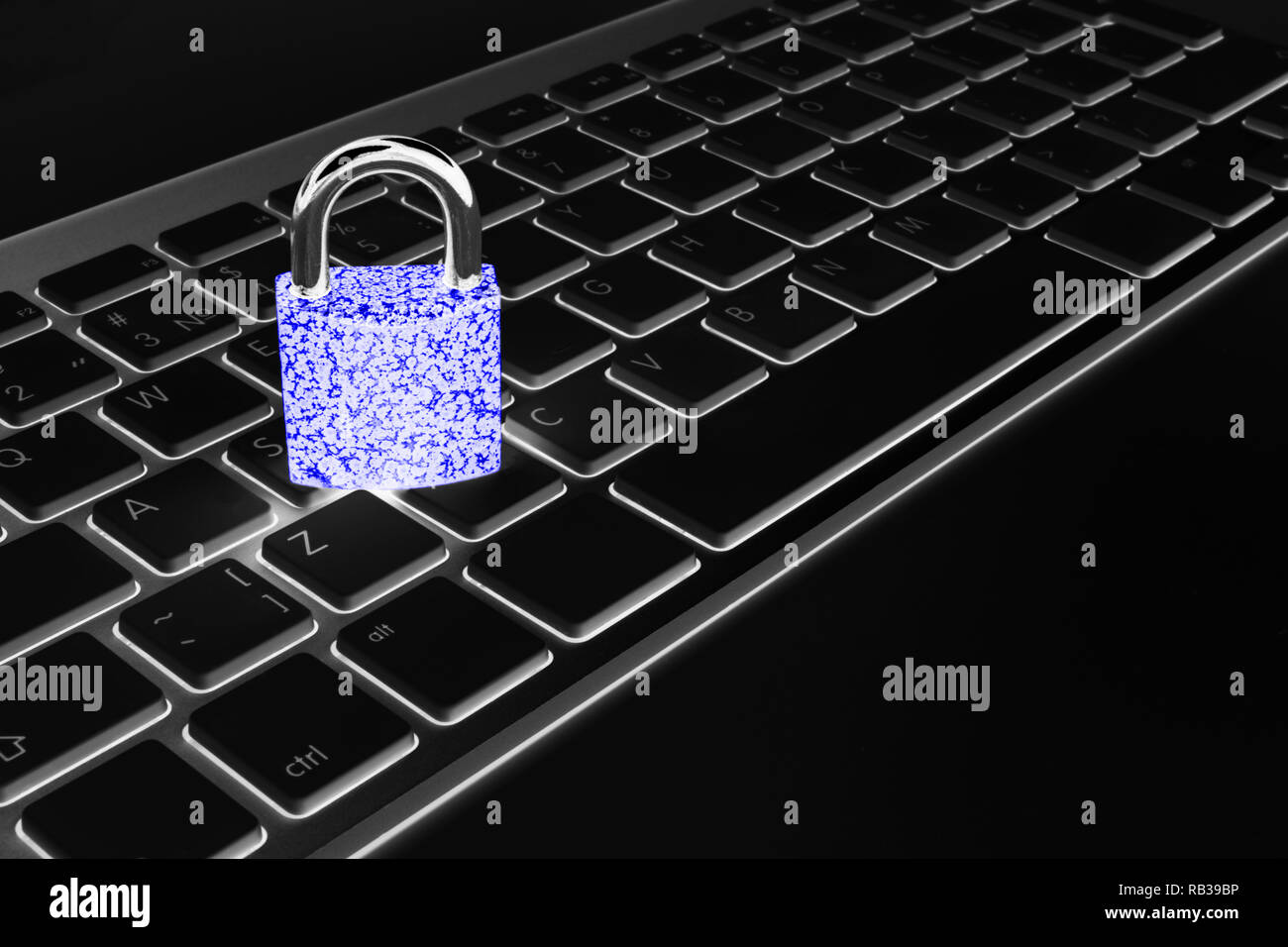 Locked computer safe from virus or malware attack. Laptop computer ...