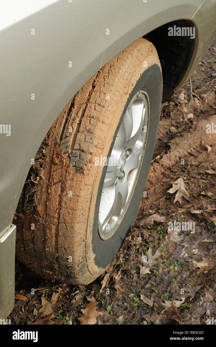 clay dirt in front wheel tire tread. Dirty front tire with North Carolina clay. Stock Photo