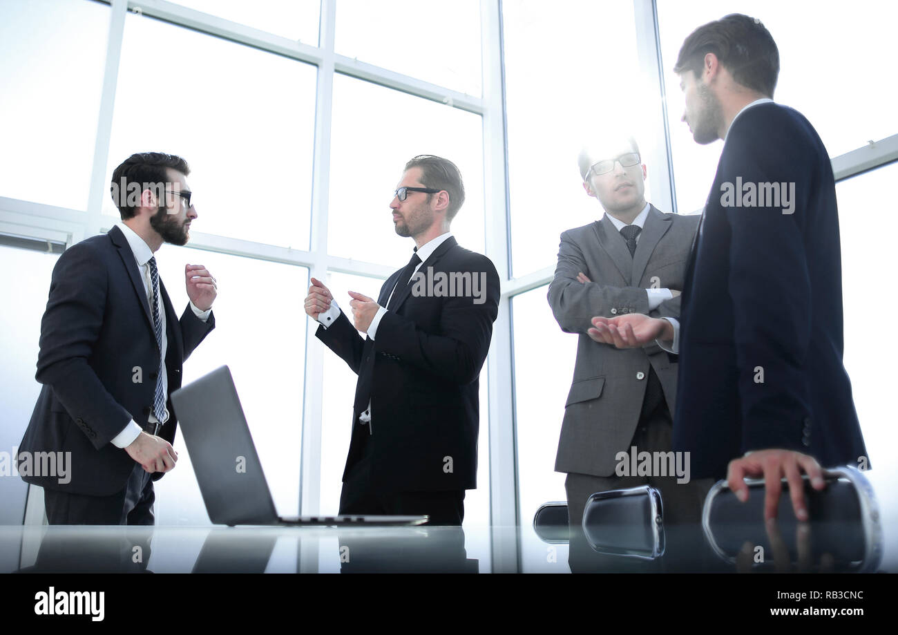 business team standing in the office of the business center Stock Photo ...