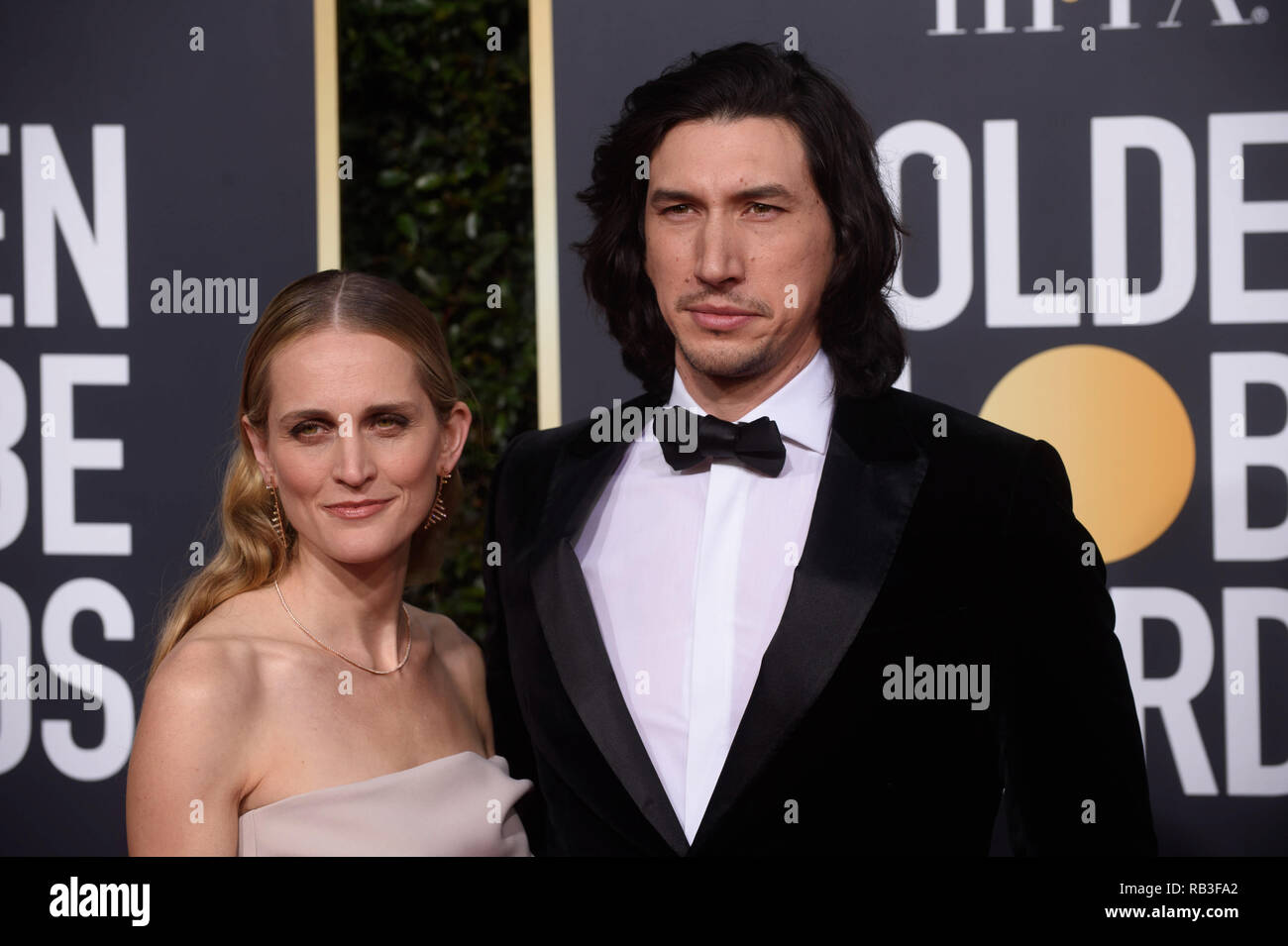 Joanne Tucker and Golden Globe nominee Adam Driver attend the 76th Annual Golden Globe Awards at the Beverly Hilton in Beverly Hills, CA on Sunday, January 6, 2019. Stock Photo