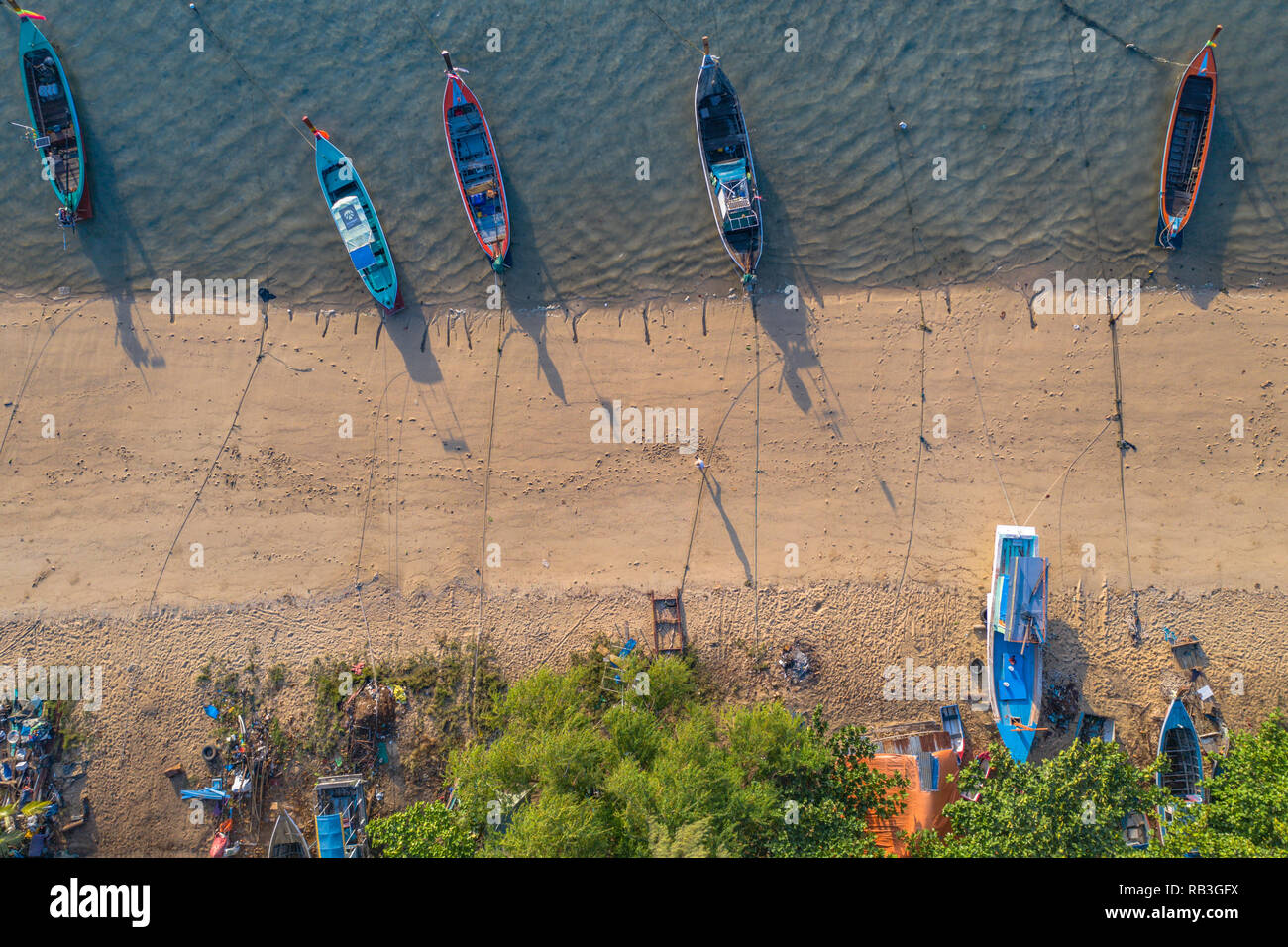 top view fishing boats in the shore during low tide at Rawai beach Phuket Thailand Stock Photo