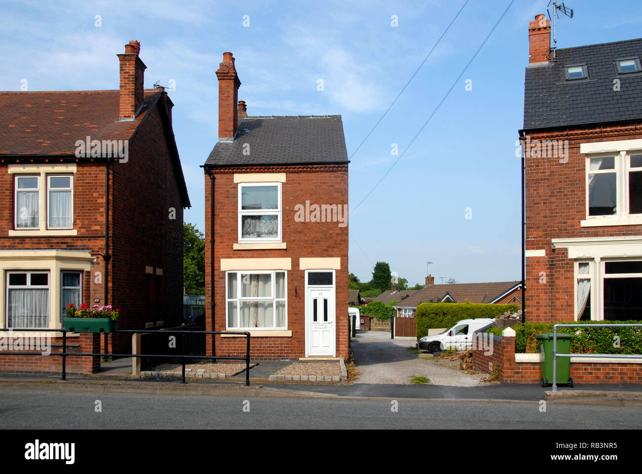 Very narrow detached house beside road, Swanwick, Derbyshire, England