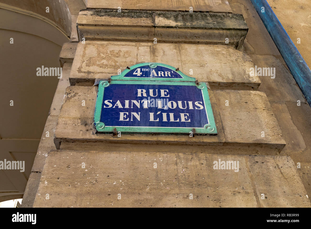 A blue Paris street sign Rue Saint-Louis en l'Île Stock Photo