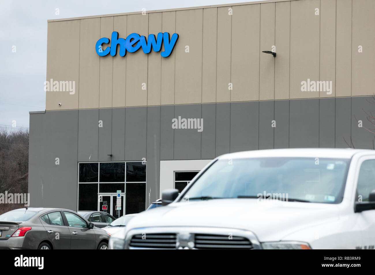 A logo sign outside of a facility occupied by Chewy in Wilkes-Barre, Pennsylvania, on December 29, 2018. Stock Photo