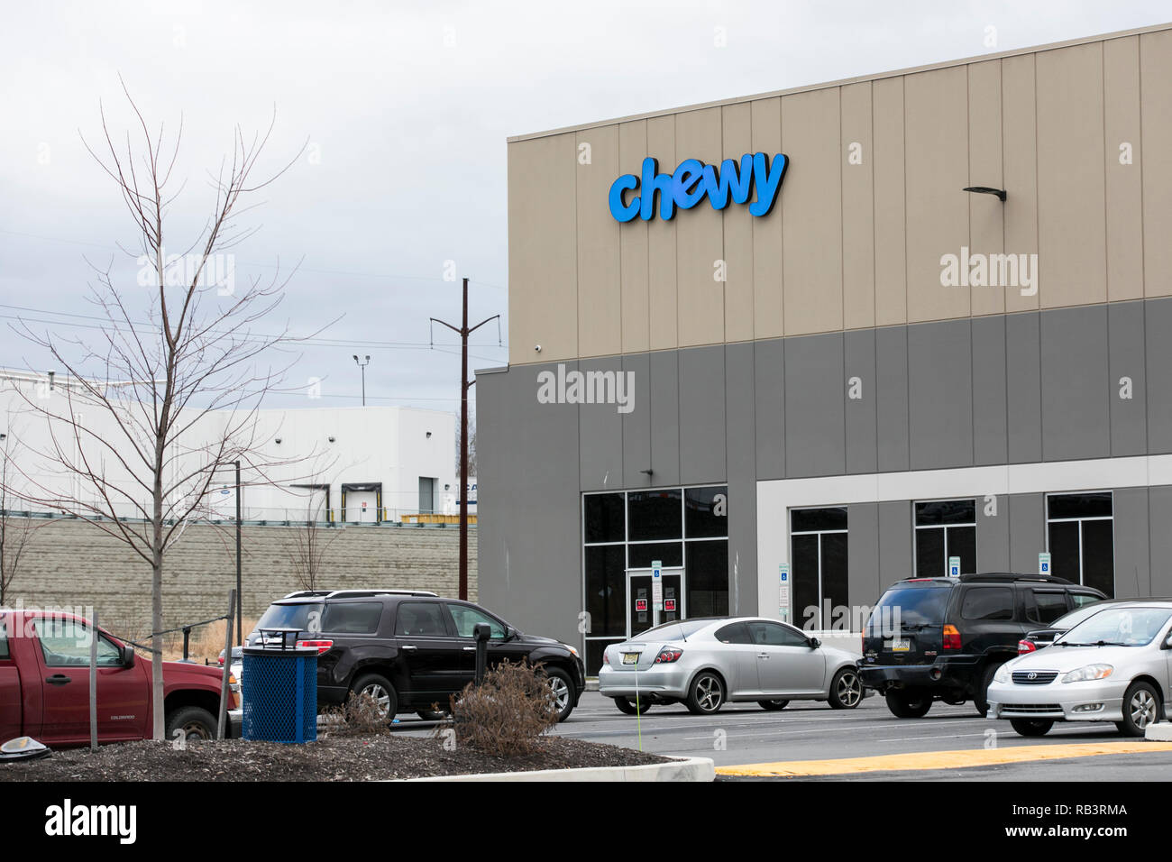 A logo sign outside of a facility occupied by Chewy in Wilkes-Barre, Pennsylvania, on December 29, 2018. Stock Photo