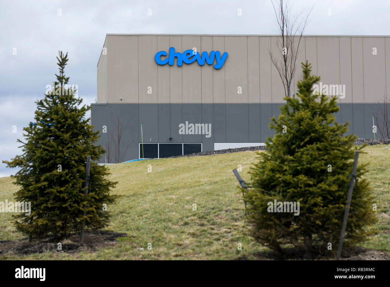 A logo sign outside of a facility occupied by Chewy in Wilkes-Barre, Pennsylvania, on December 29, 2018. Stock Photo