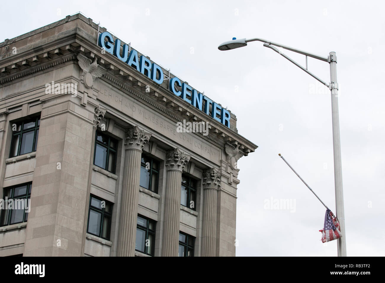 A logo sign outside of the headquarters of the GUARD Insurance Group in