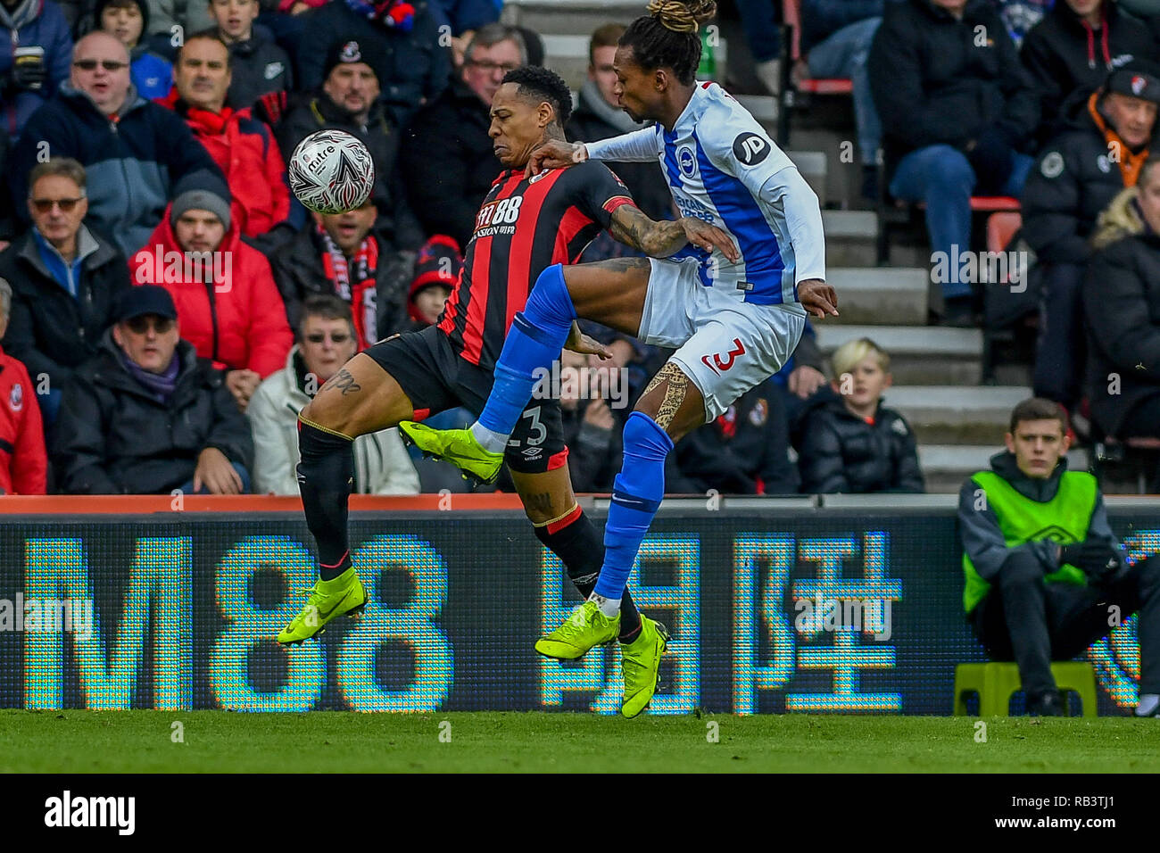 5th January 2019, Dean Court, Bournemouth, England; The Emirates FA Cup, 3rd Round, Bournemouth vs Brighton ; Gaëtan Bong (03) of Brighton tackles Nathan Clyne (23) of bournemouth  Credit: Phil Westlake/News Images   English Football League images are subject to DataCo Licence Stock Photo