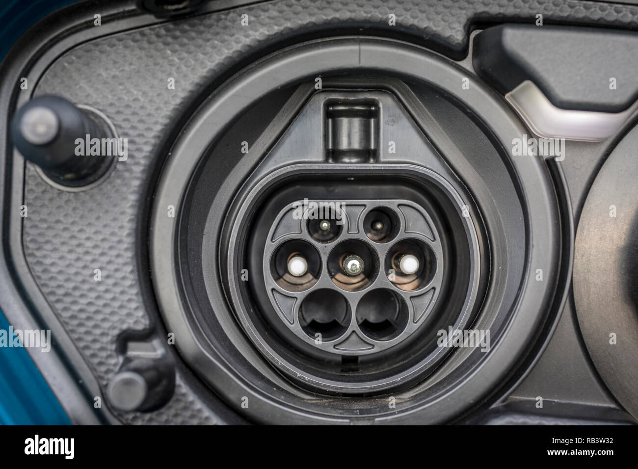 Charge port on an electric car Stock Photo