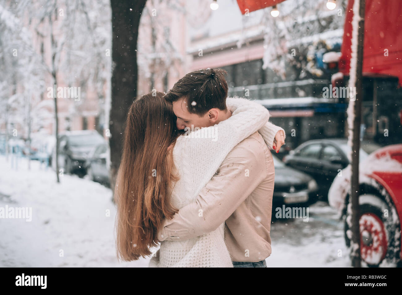 Attractive guy kissing girl hires stock photography and images Alamy