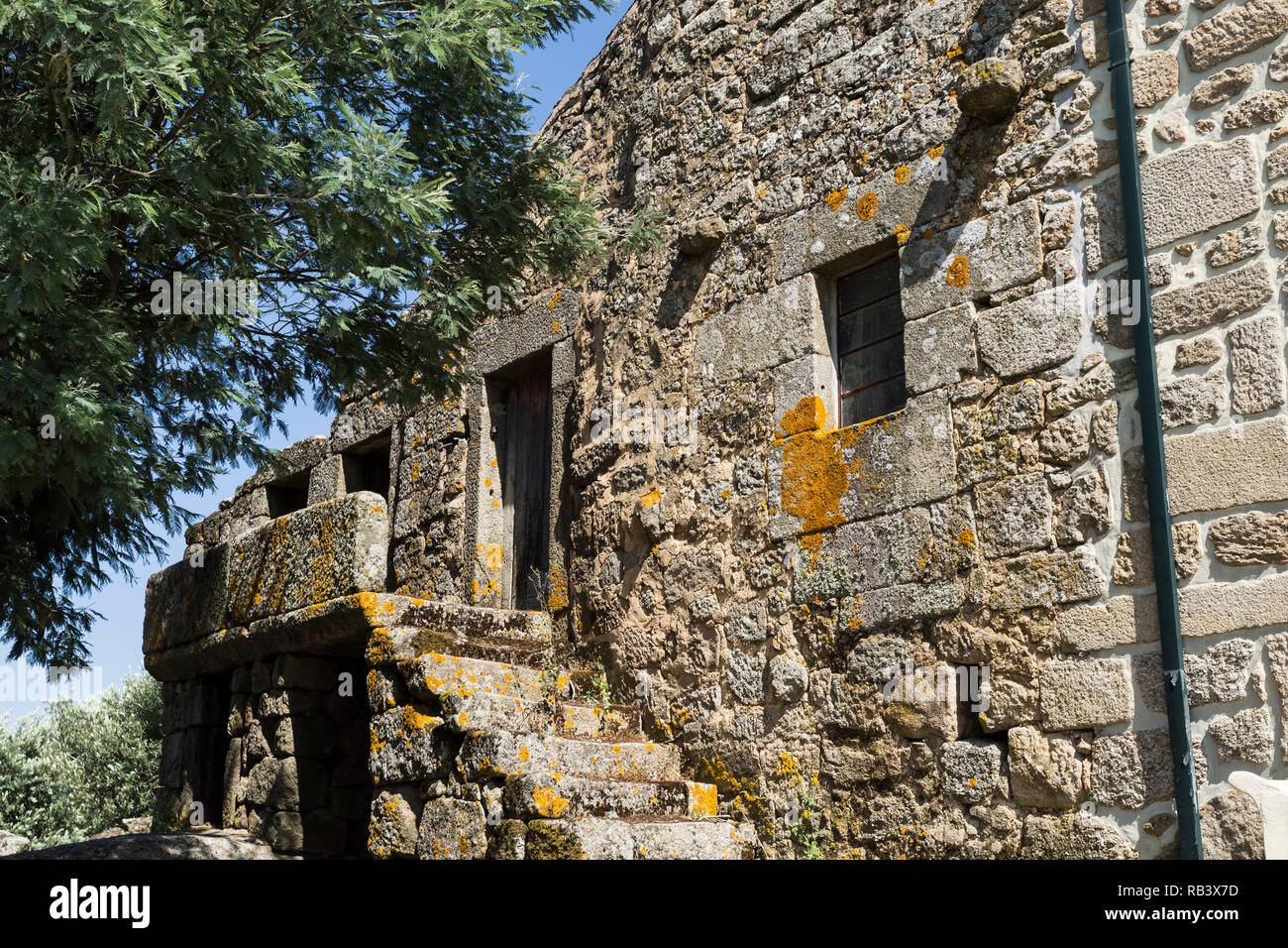 Traditional local granite house of the rural architecture of the Beira Alta region in Portugal Stock Photo