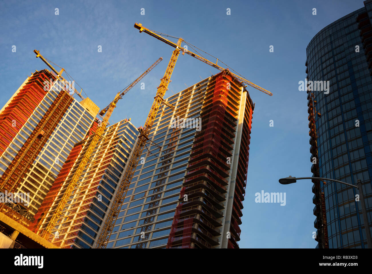 High-rise apartment buildings under construction in downtown Los ...