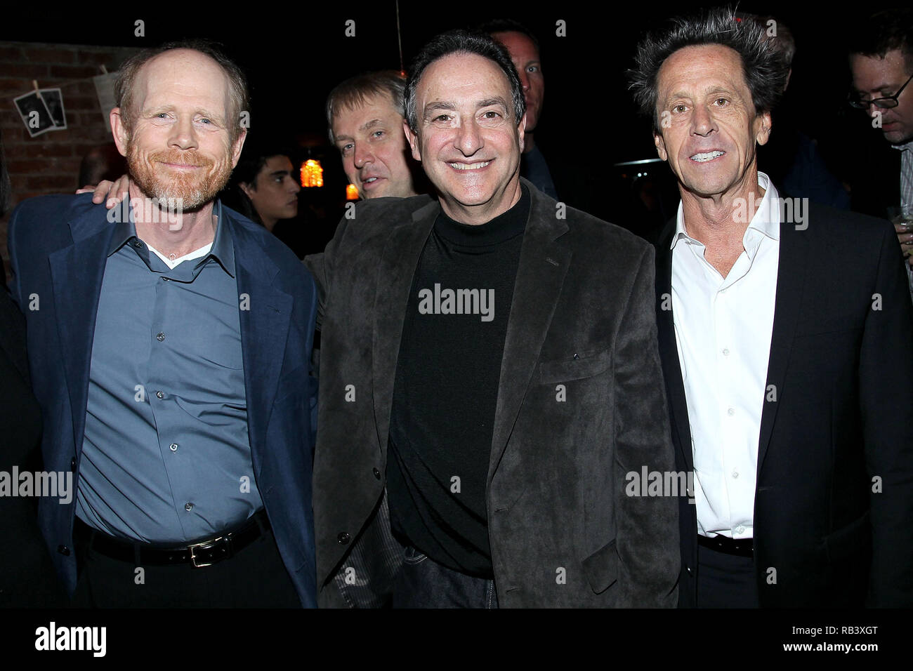 NEW YORK, NY - APRIL 30:  Director Ron Howard, journalist Ira Flatow and producer Brian Grazer attend 'A Beautiful Mind' Reception during the 10th annual Tribeca Film Festival at The Chelsea Room on April 30, 2011 in New York City.  (Photo by Steve Mack/S.D. Mack Pictures) Stock Photo