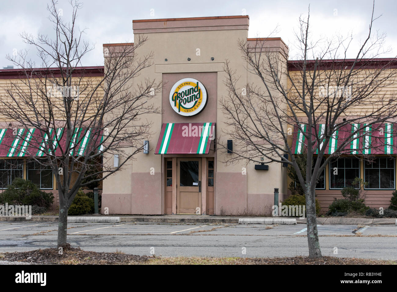 A logo sign outside of an abandoned Ground Round restaurant in Hazleton, Pennsylvania, on December 29, 2018. Stock Photo