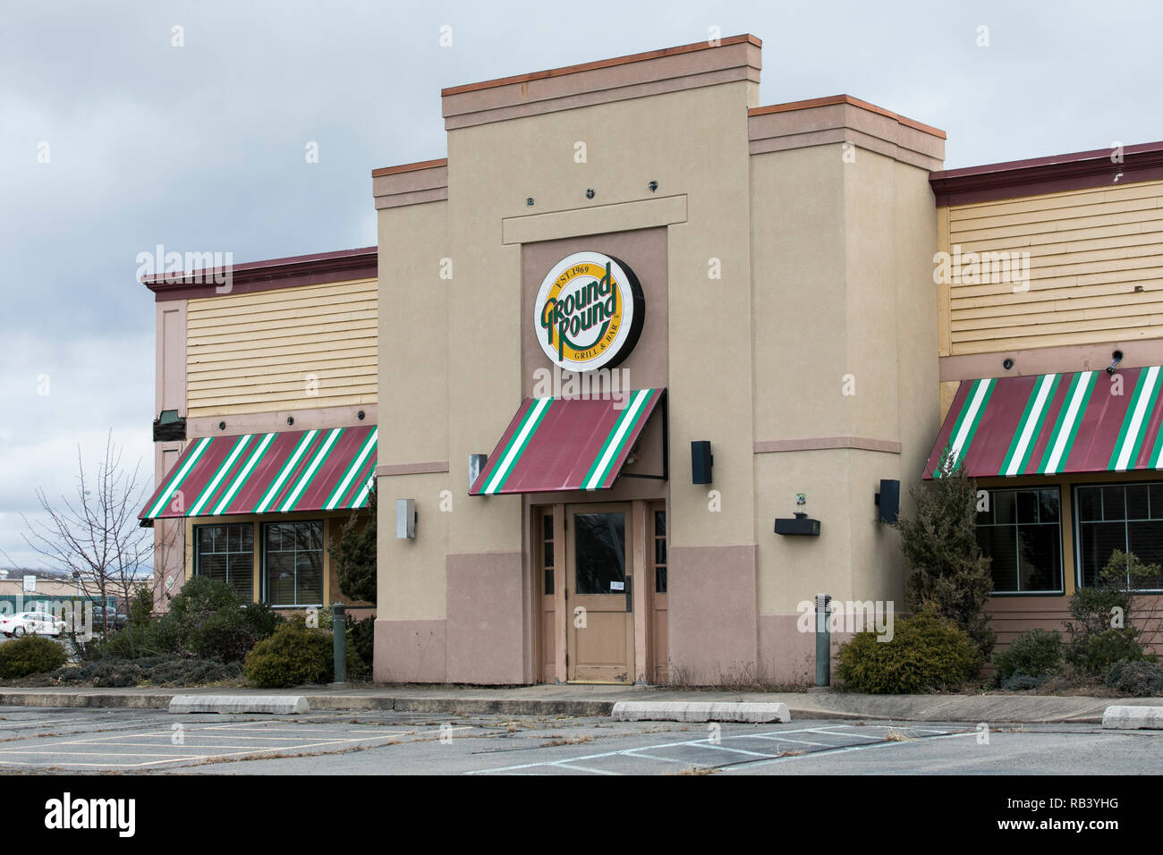 A logo sign outside of an abandoned Ground Round restaurant in Hazleton