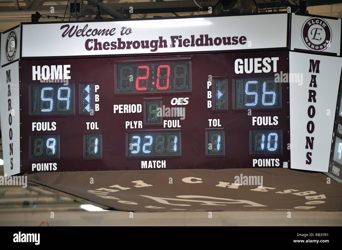 Elgin, Illinois, USA. Modern four-sided high school gymnasium scoreboard. Stock Photo