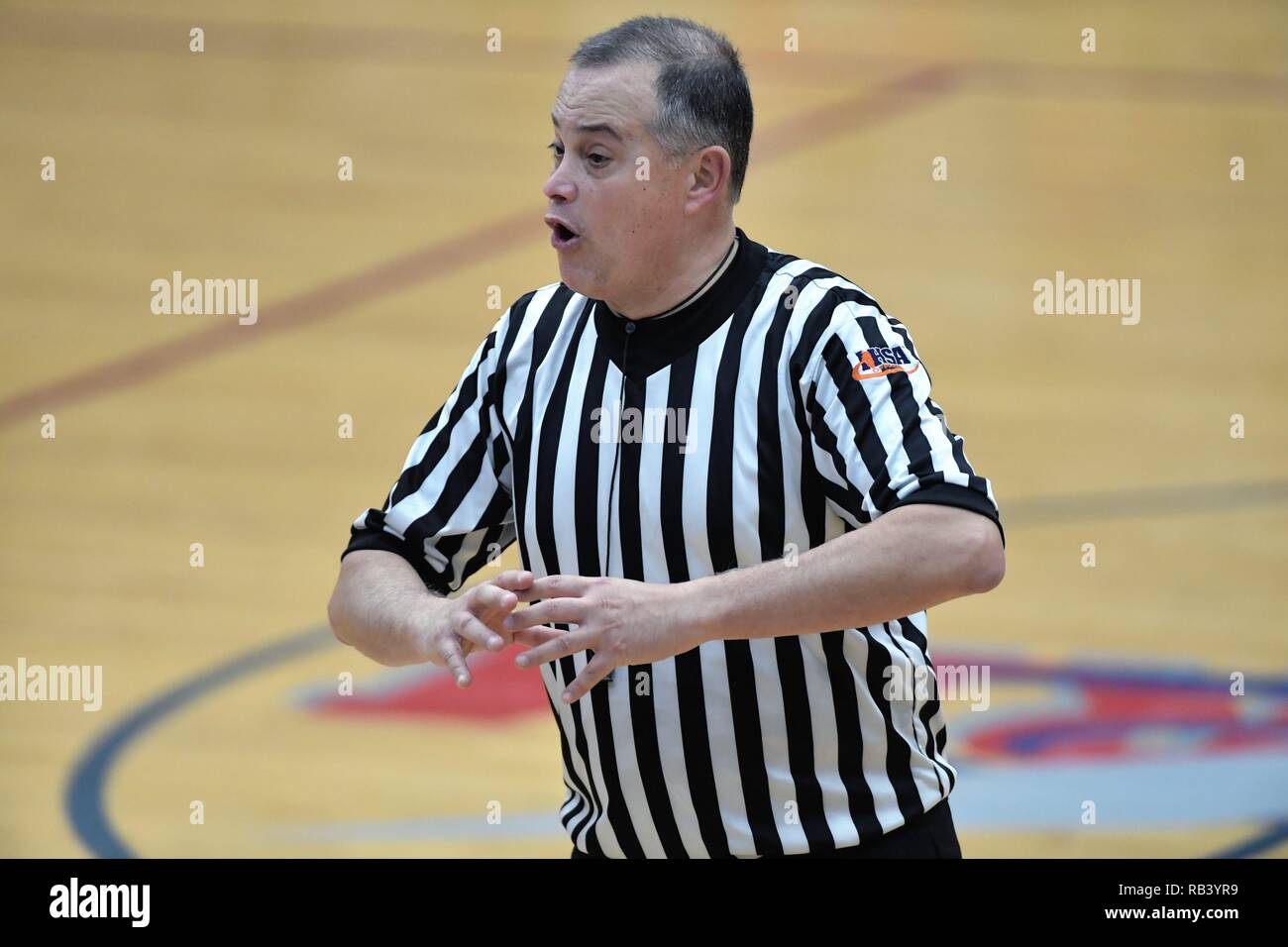 South Elgin, Illinois, USA, Official communicating the results of a call to the scorer's table. Stock Photo