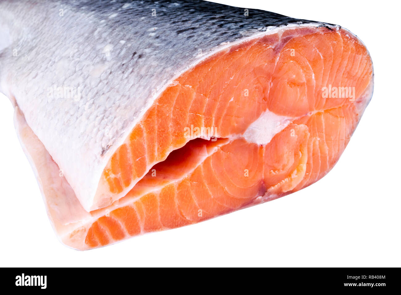 Fresh salmon steak isolated on the white background. Salmon Red Fish Steak. Large Pile of trout steak. Big organic steaks of salmon lined up. Big piec Stock Photo