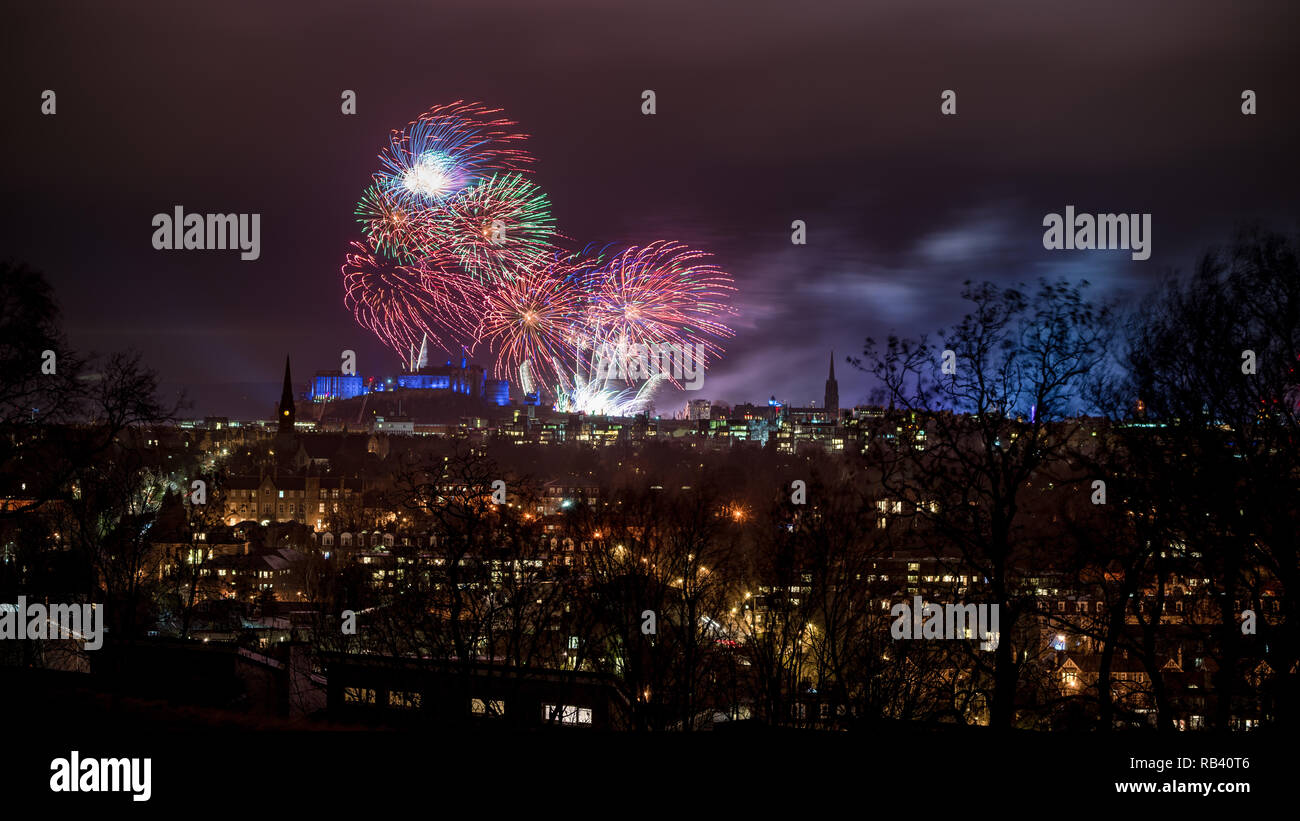 Fireworks above Edinburgh Castle during Hogmanay, New Year's Eve Stock Photo
