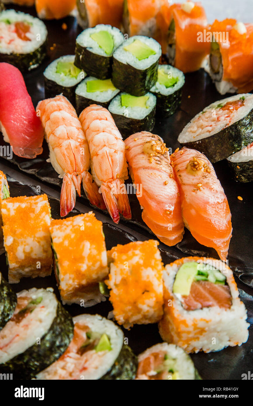 Delicious sushi menu, for deliver at home, dinner with family and friends Stock Photo Alamy