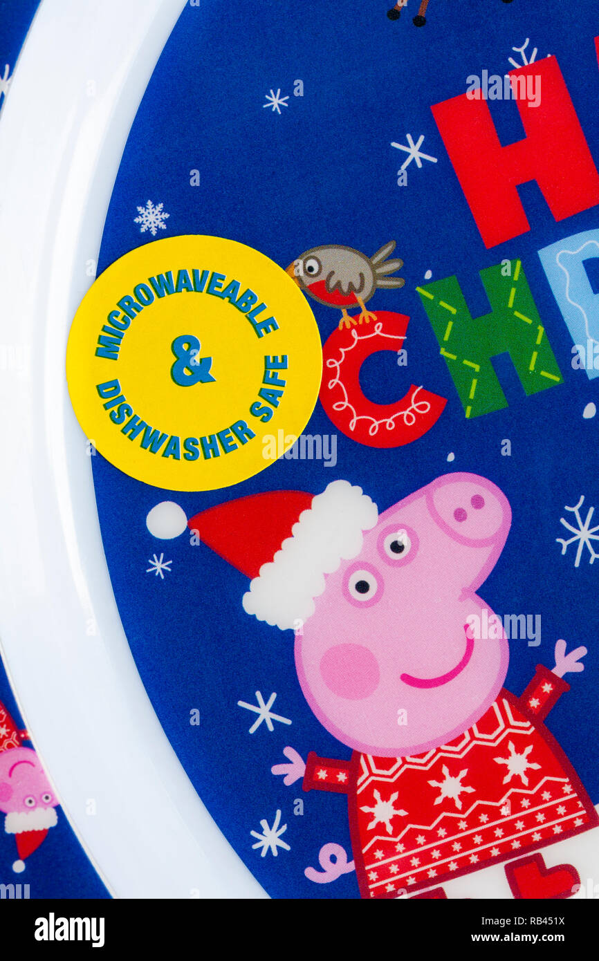 Microwaveable & Dishwasher Safe sticker on child's Peppa Pig Christmas plate Stock Photo