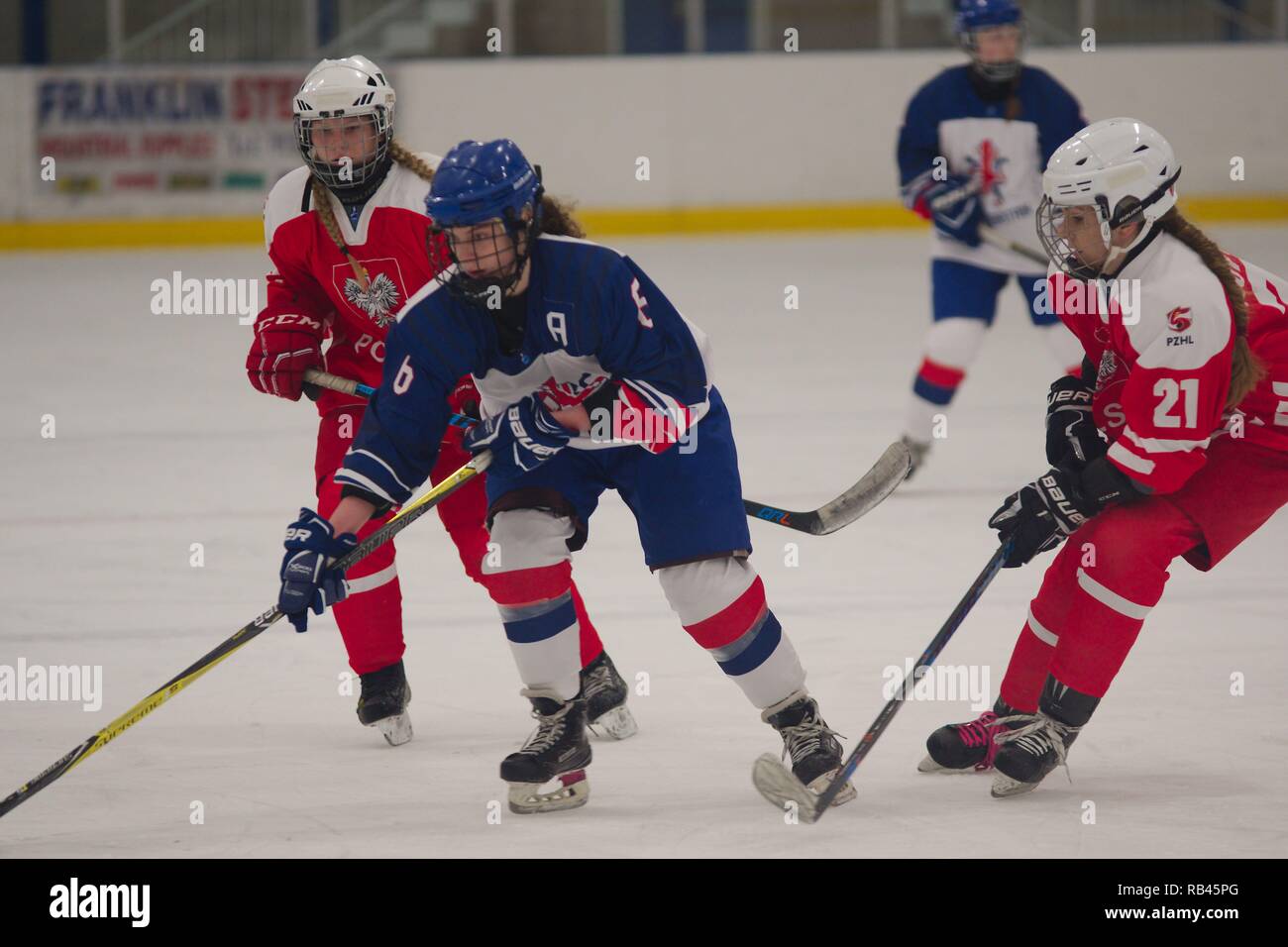 Dumfries, Scotland, UK. 6th January 2019. Verity Lewis, alternate captain for Great Britain attacking against Poland during their match in the 2019 Ice Hockey U18 Women’s World Championship, Division 1, Group B at Dumfries Ice Bowl. Credit: Colin Edwards/Alamy Live News. Stock Photo